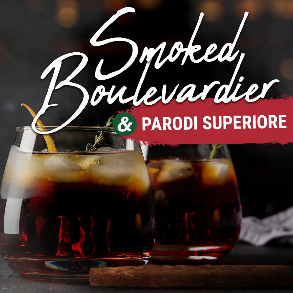 A smoked boulevardier drink next to a Parodi Superiore cigar