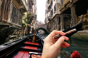 Smoking a Parodi cigar on a Gondola in Venice, Italy